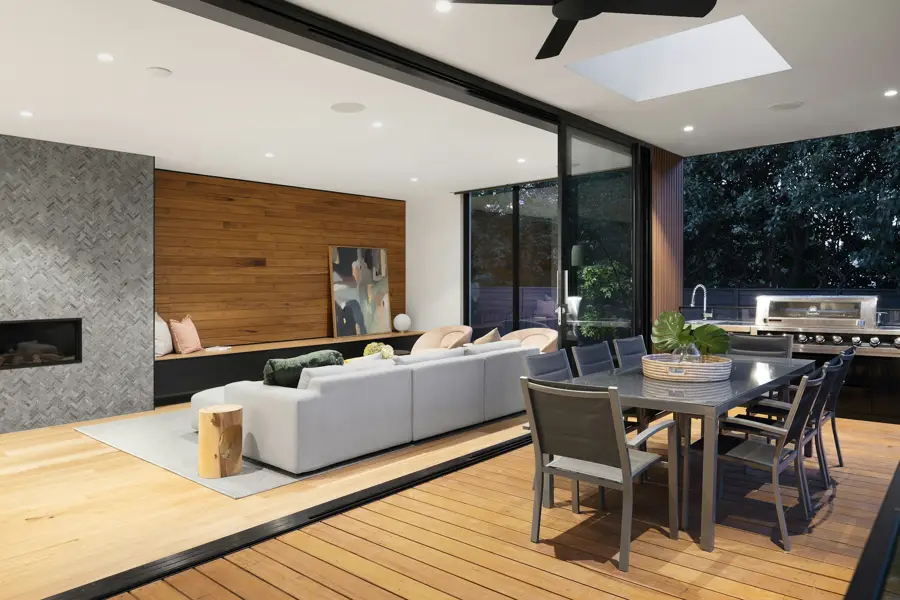 Indoor-outdoor living room opening to a lanai